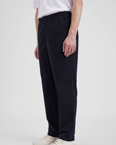 Norse Projects Ezra Relaxed Cotton Wool Twill Trousers in Dark Navy